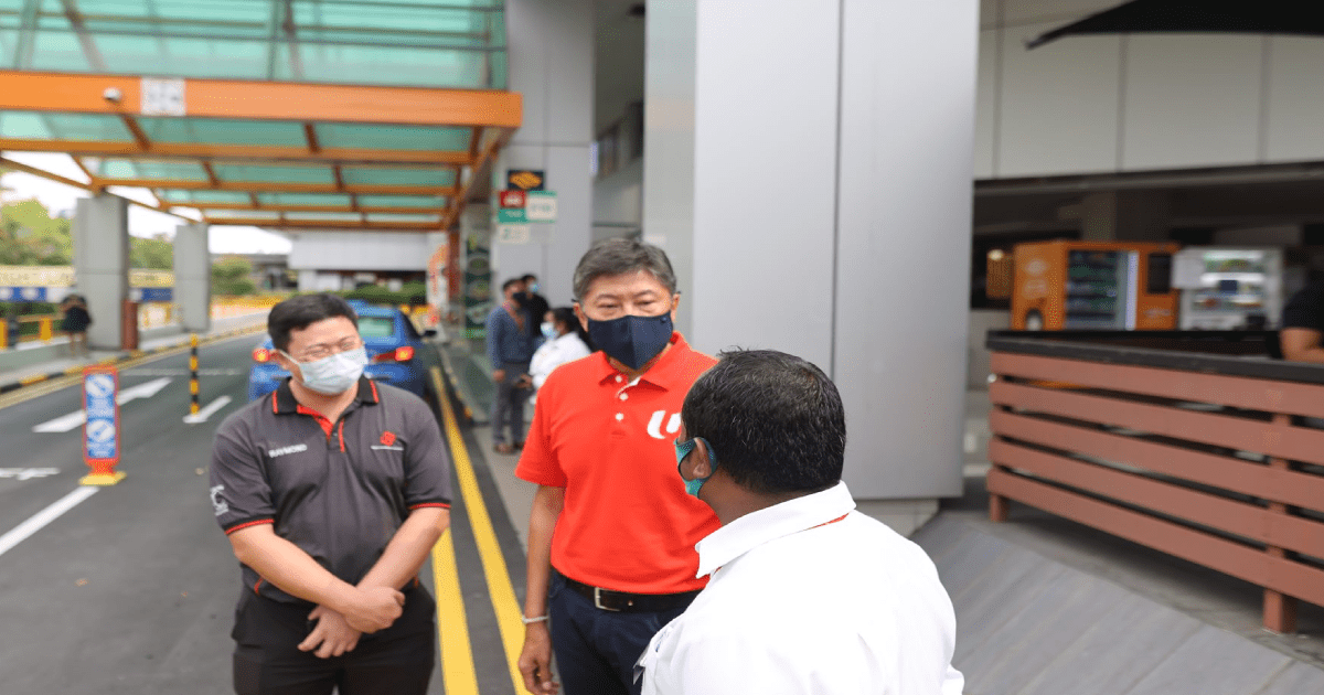 Ng Chee Meng with Security Officer